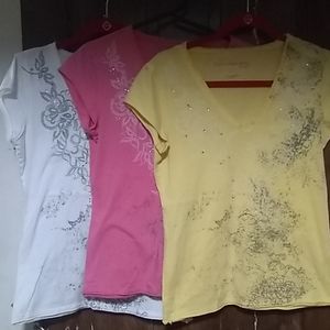 three Calvin Klein t-shirts